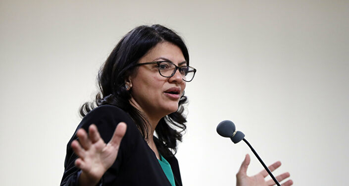 Rashida Tlaib, Democratic candidate for Michigan's 13th Congressional District, speaks at a rally in Dearborn, Mich., Friday, Oct. 26, 2018. 