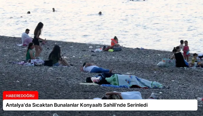 Antalya’da Sıcaktan Bunalanlar Konyaaltı Sahili’nde Serinledi